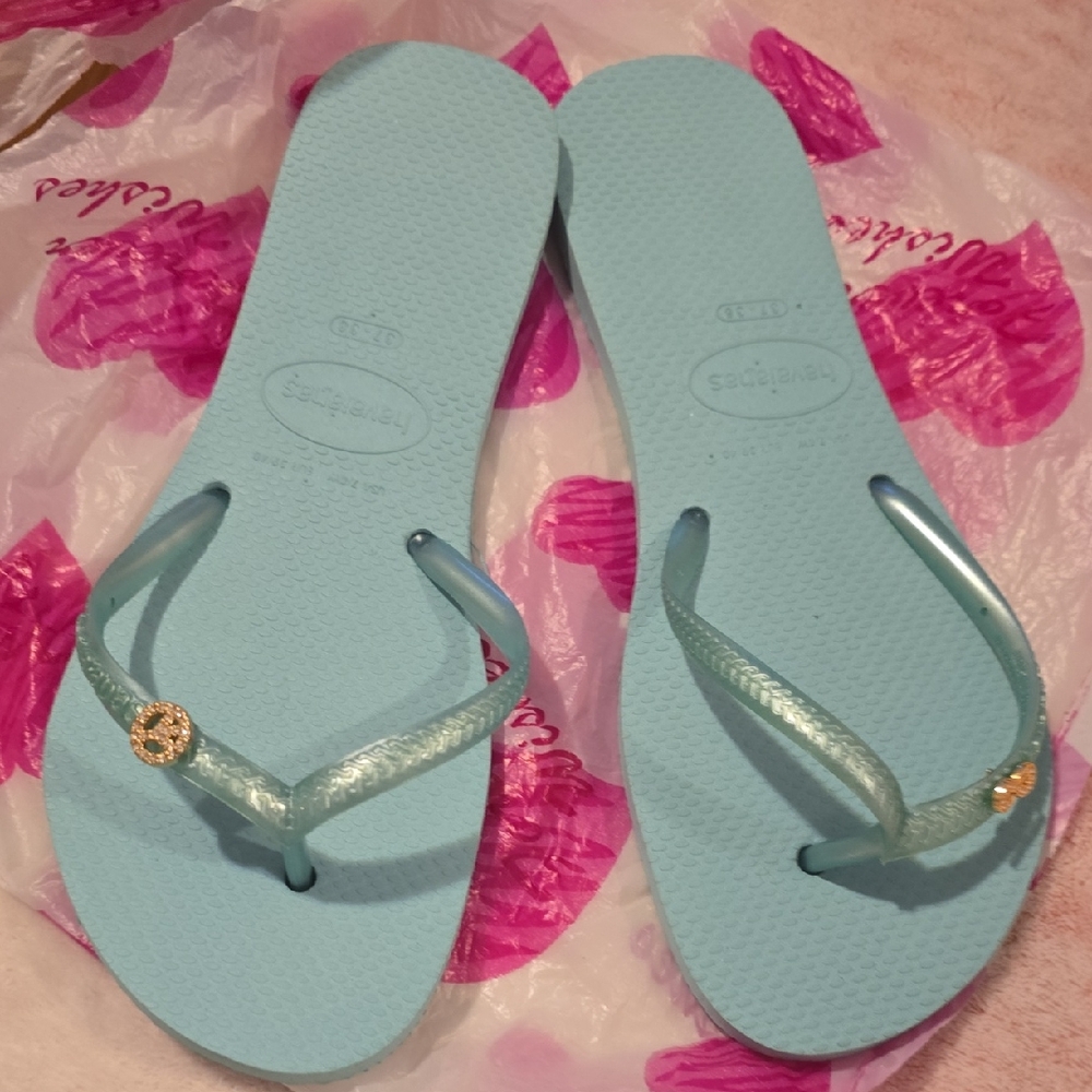 Havaianas Sky Blue Flip Flops with Gold Charm